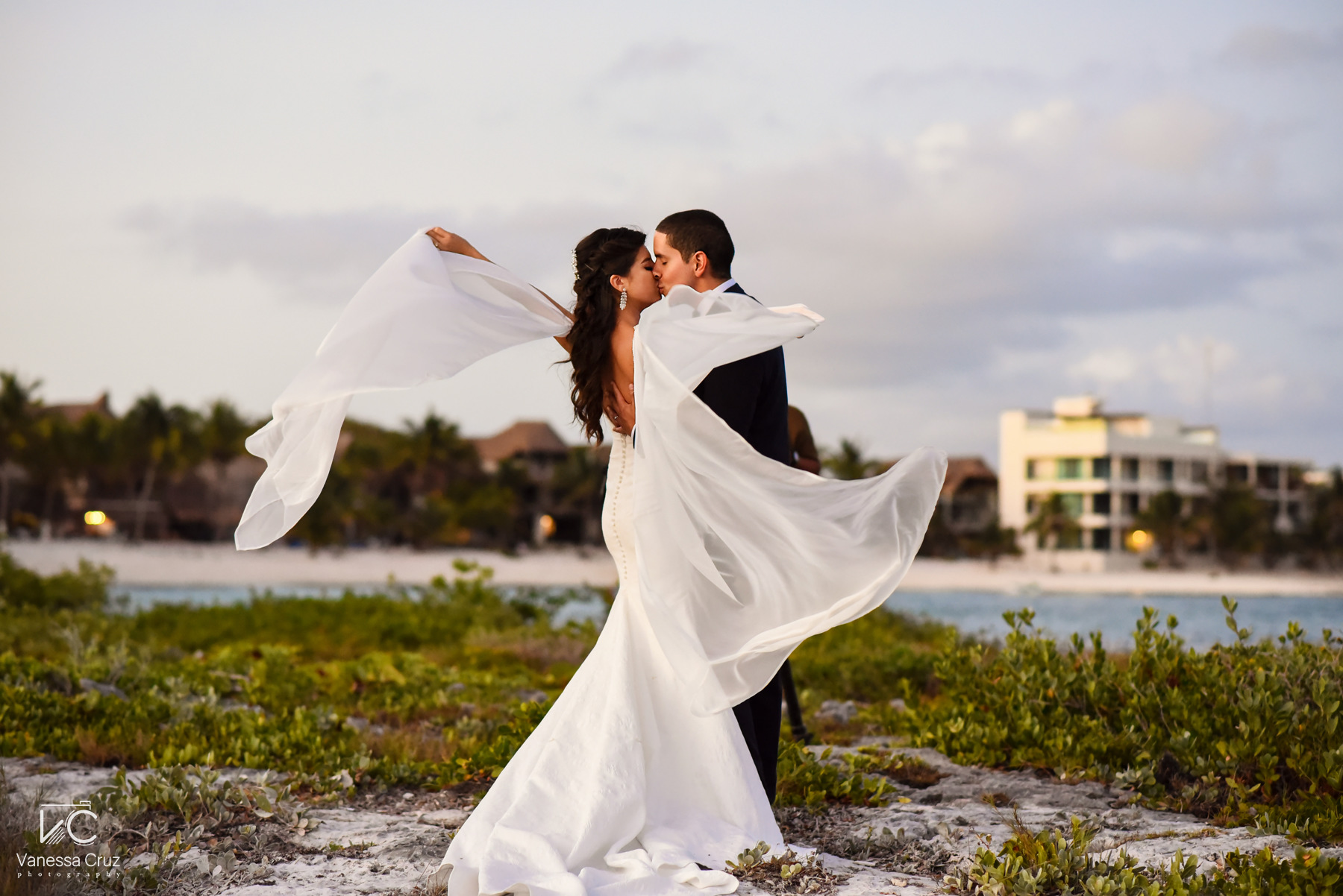 Bride wedding dress flying beach portraits blue venado mexico