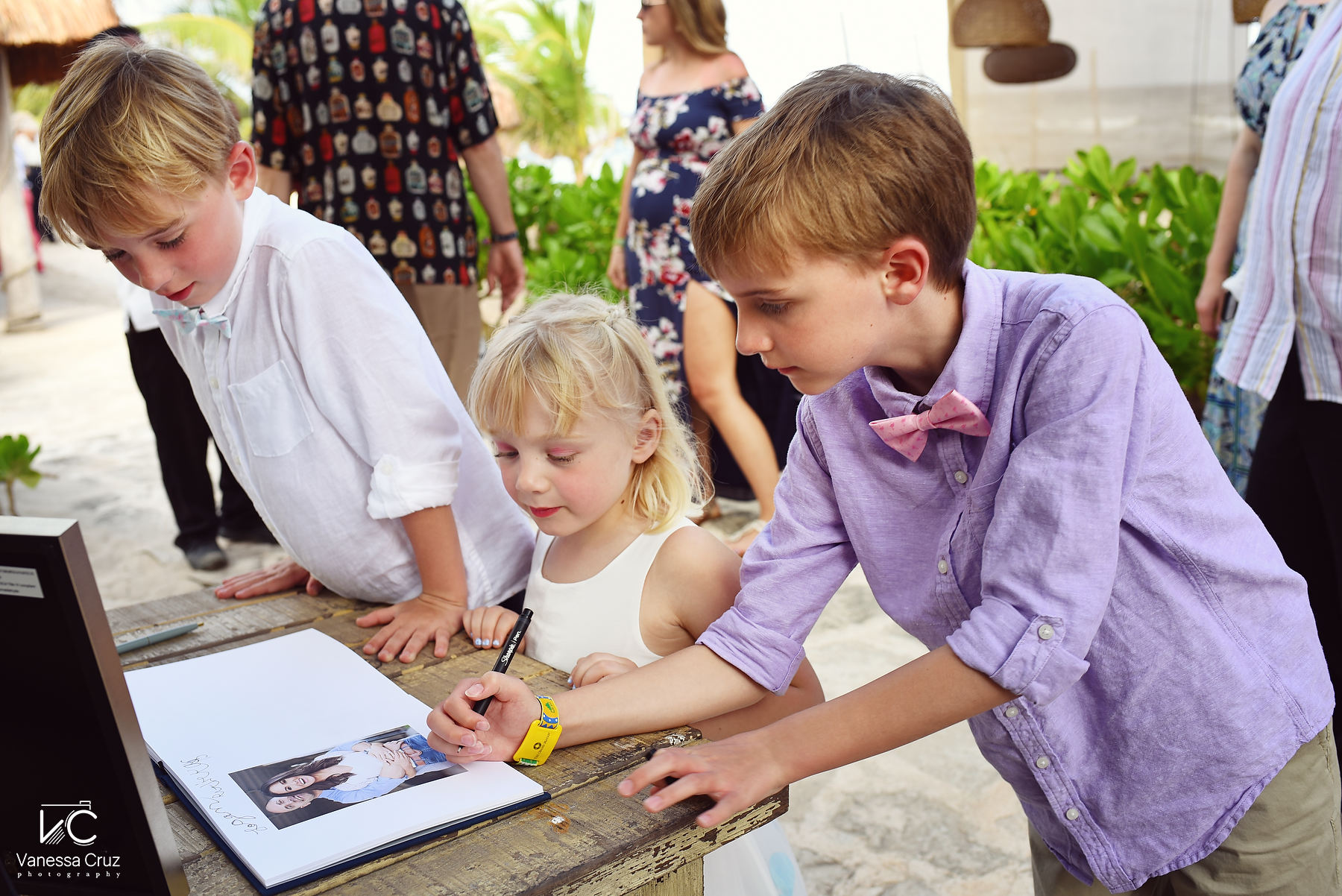 Wedding kids signing guestbook Blue Venado Riviera Maya