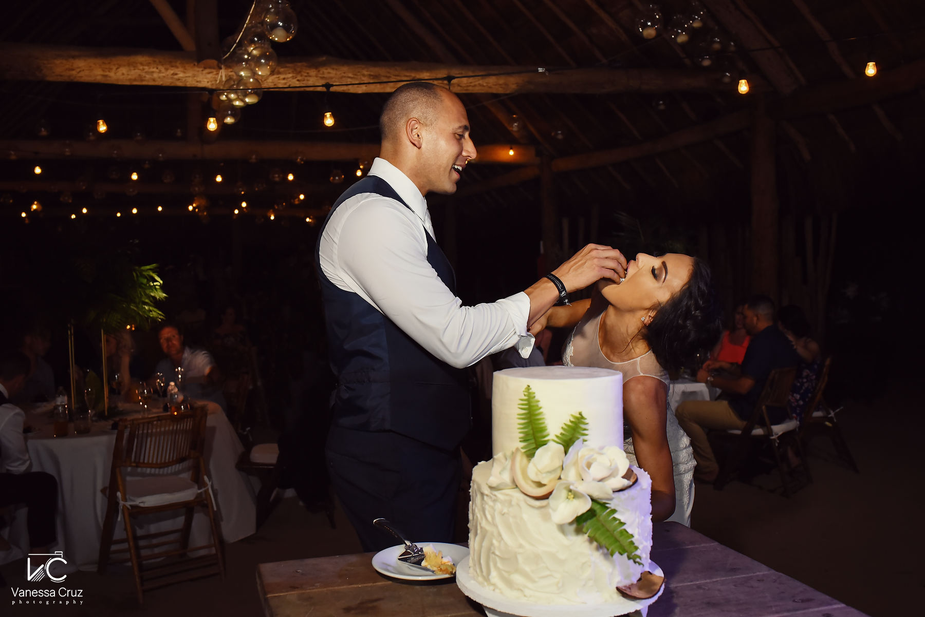 cake cutting bride and groom Blue Venado Riviera Maya