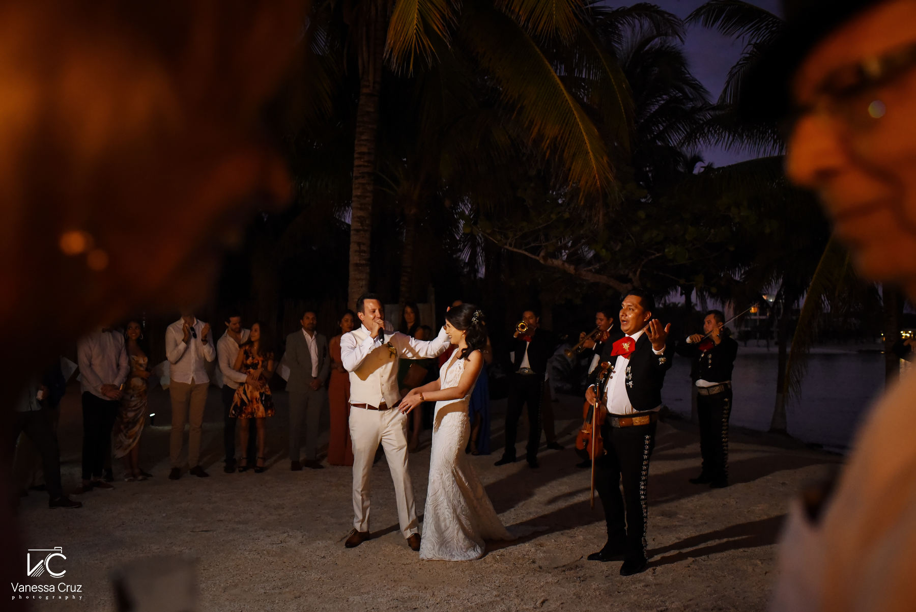 bride and groom dancing with Mexican Mariachi blue Venado Riviera Maya Mexico