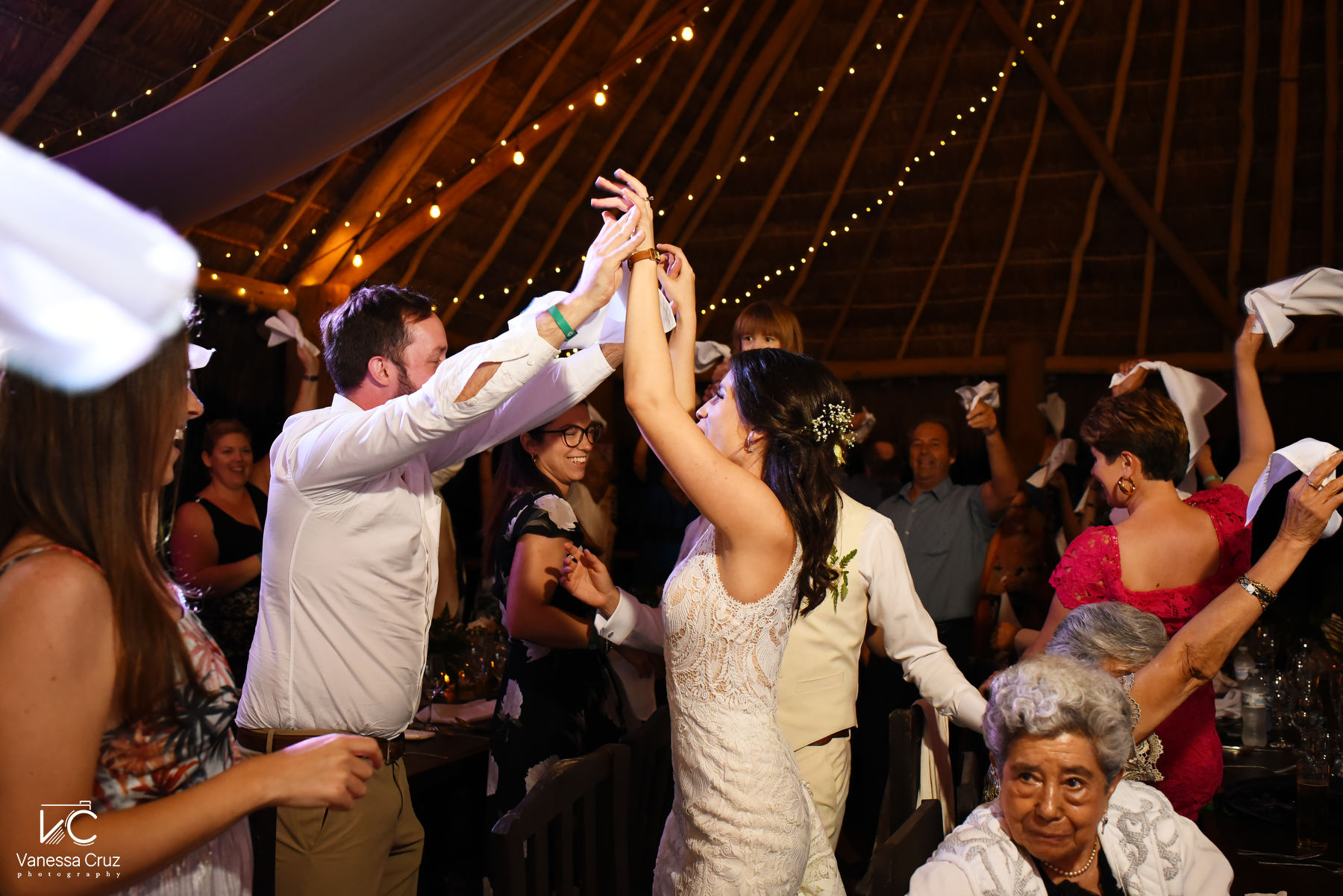 bride and groom celebrating with guests blue Venado Riviera Maya Mexico