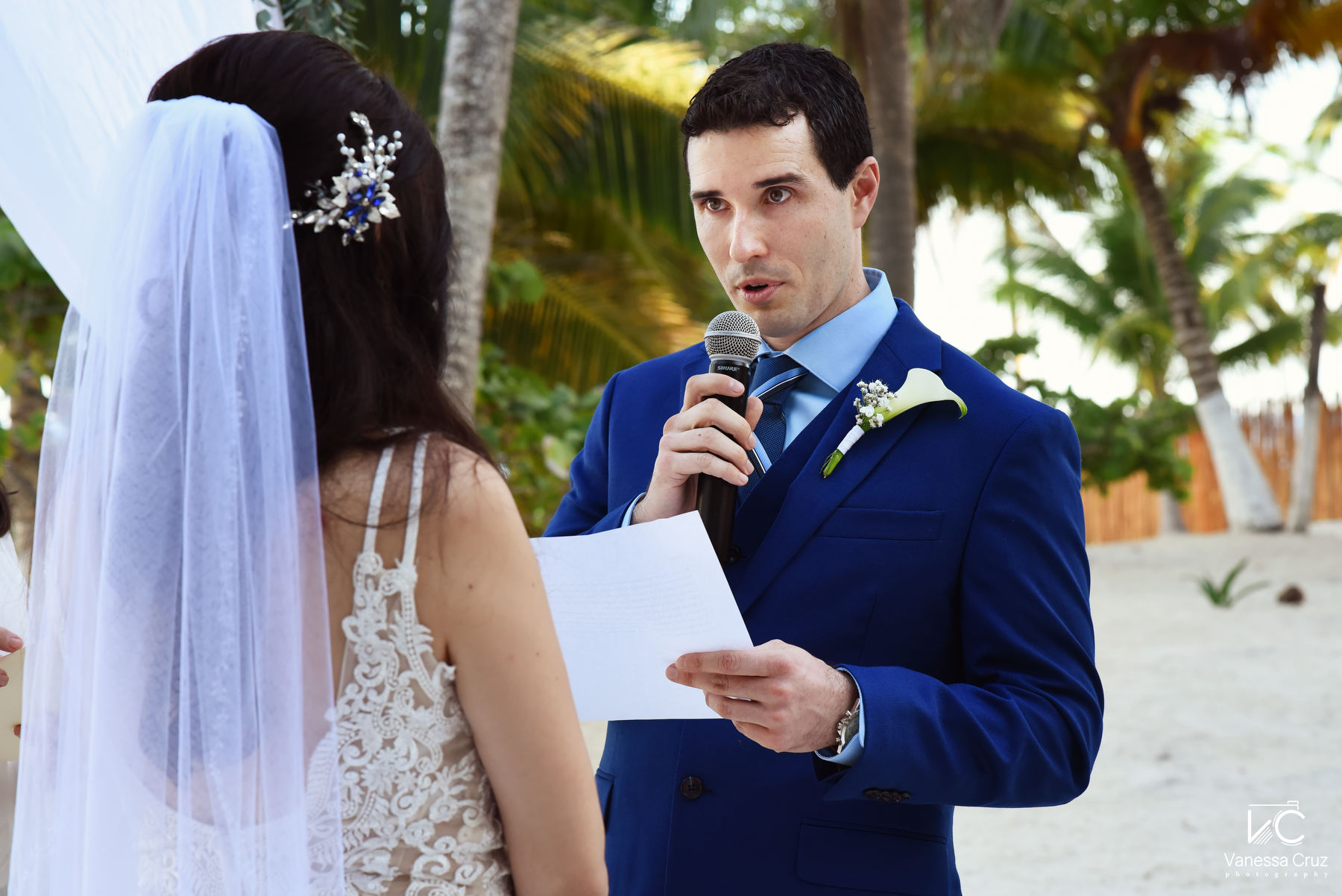 Groom vows wedding ceremony Blue Venado Beach Mexico