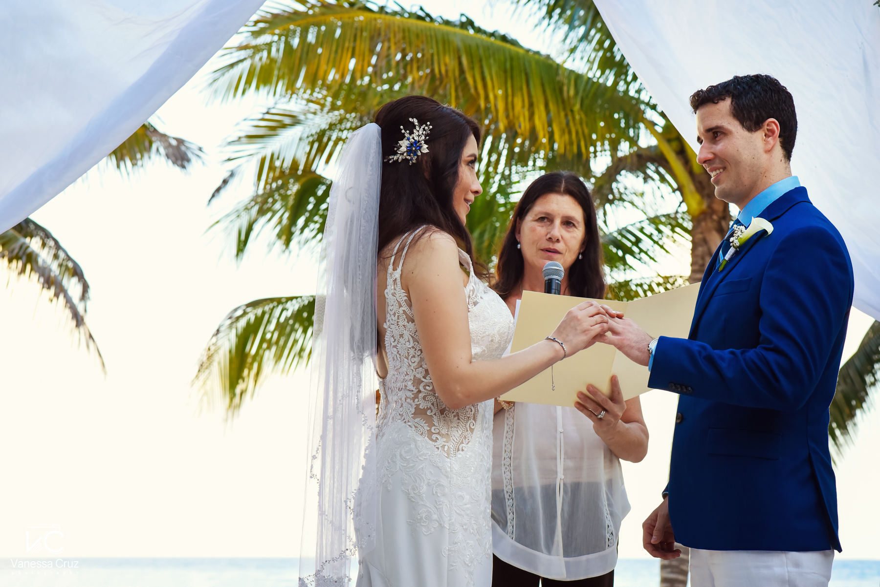 Exchange rings bride and groom private beach ceremony Playa del Carmen Mexico