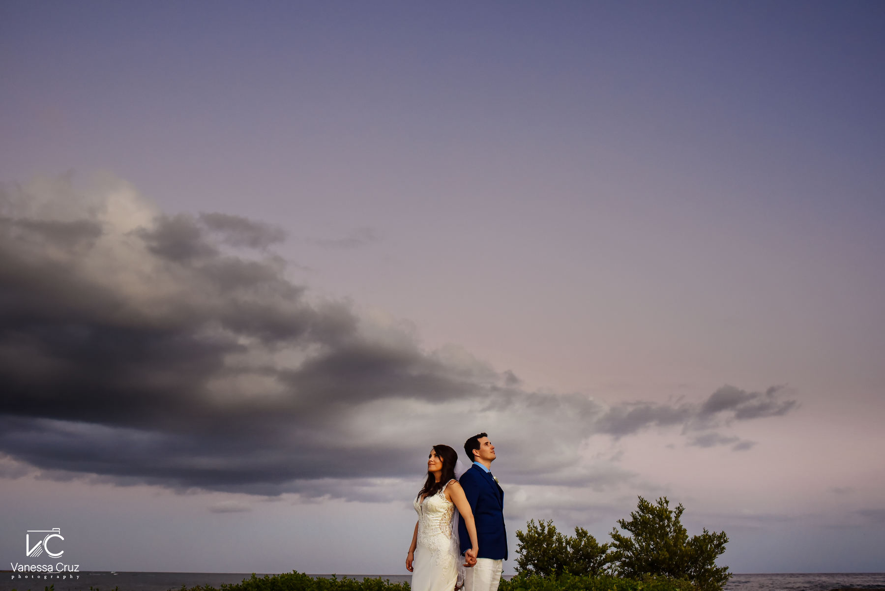 Bride and Groom with purple sky wedding portrait