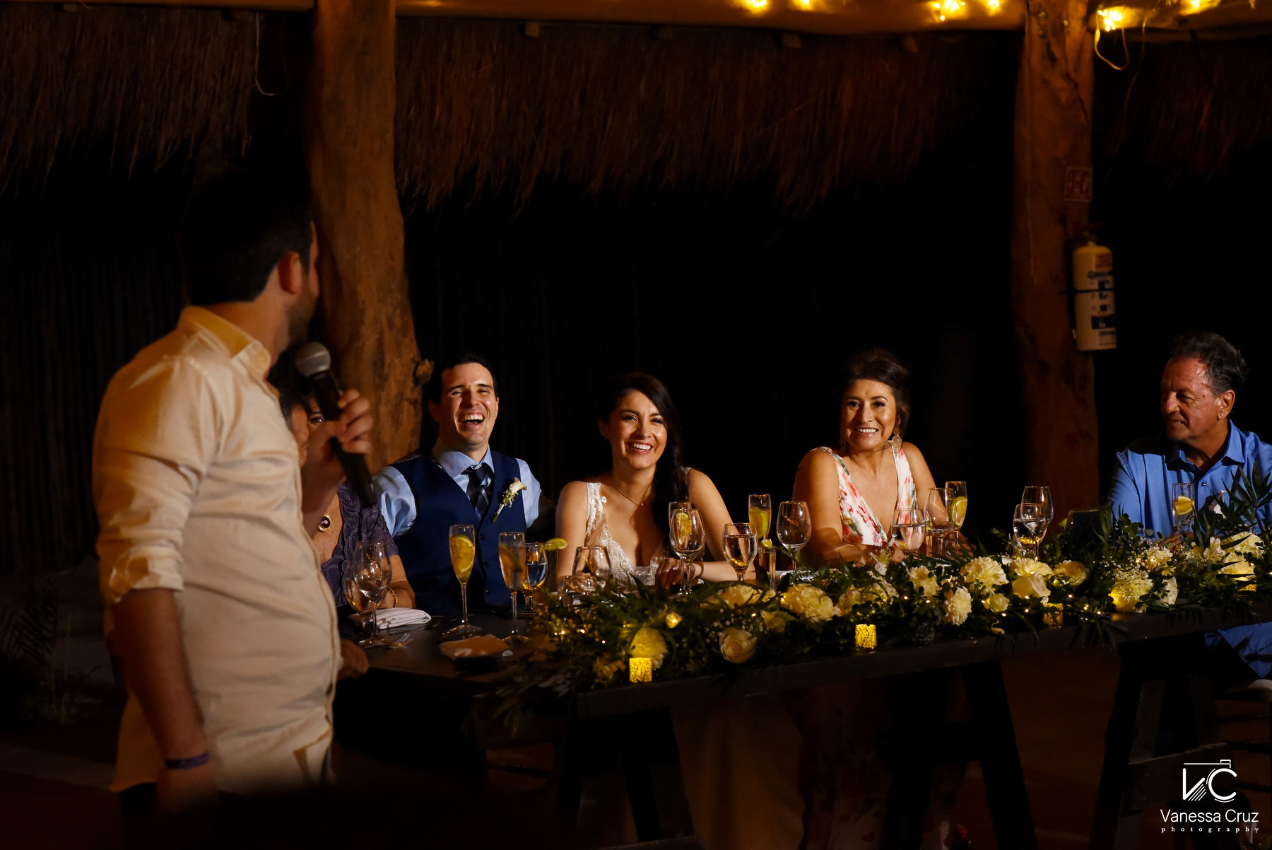 Wedding toast bride and groom smiling destination wedding Playa del Carmen Mexico