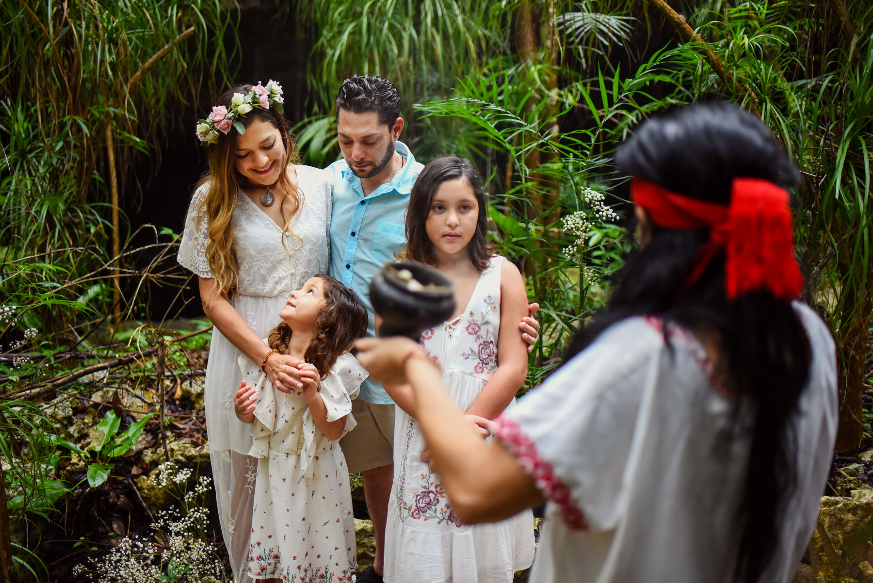 chaman blessing family Cenote Tulum Mexico