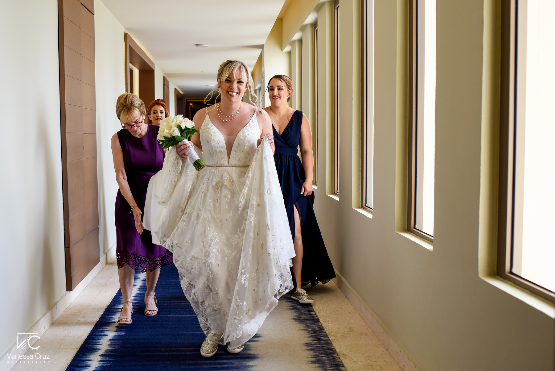 Bride and bridesmaids walking to ceremony Destination Wedding Hyatt Ziva Cancun Mexico