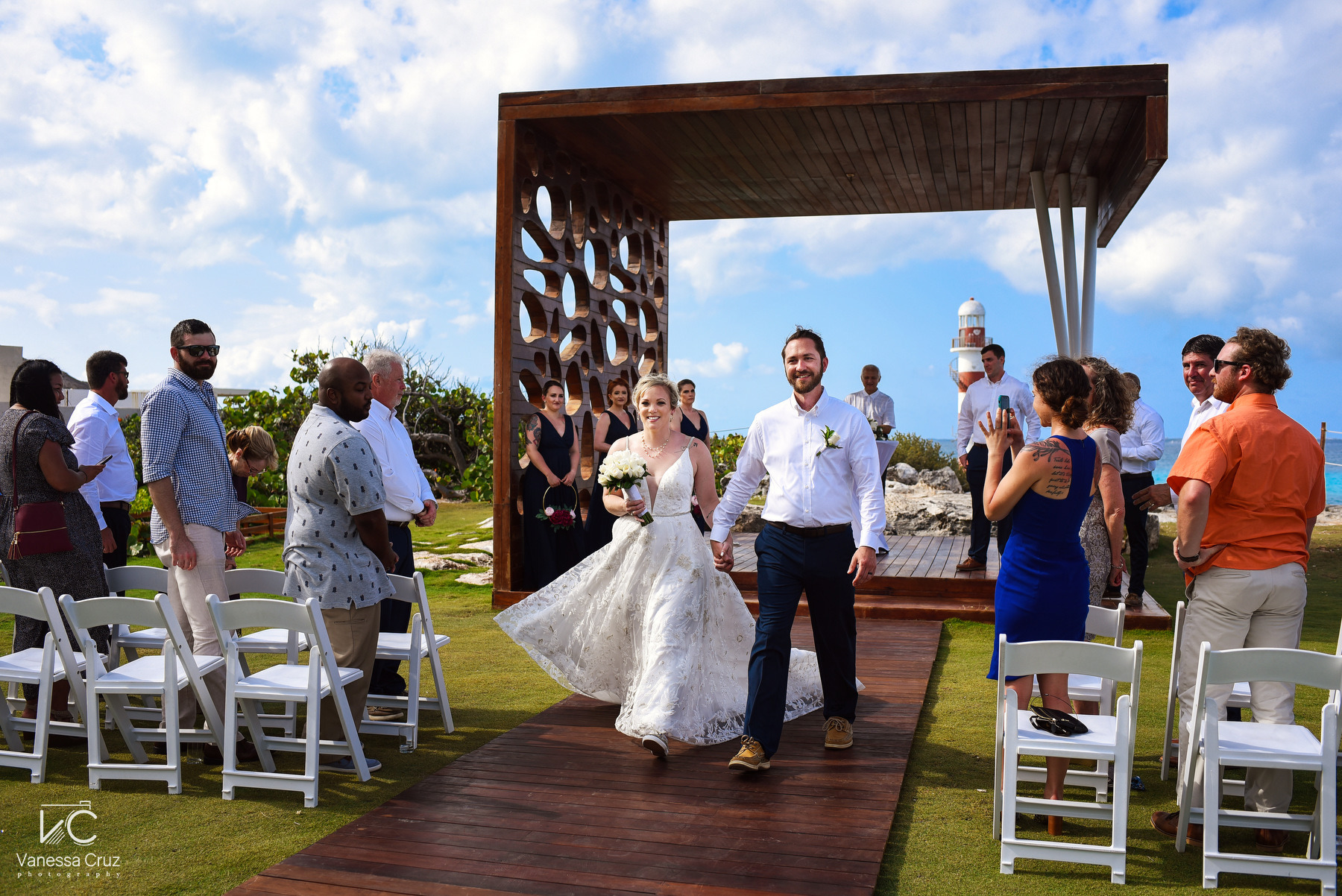 Bride and groom Wedding exit Lighthouse Gazebo Hyatt Ziva Cancun Mexico