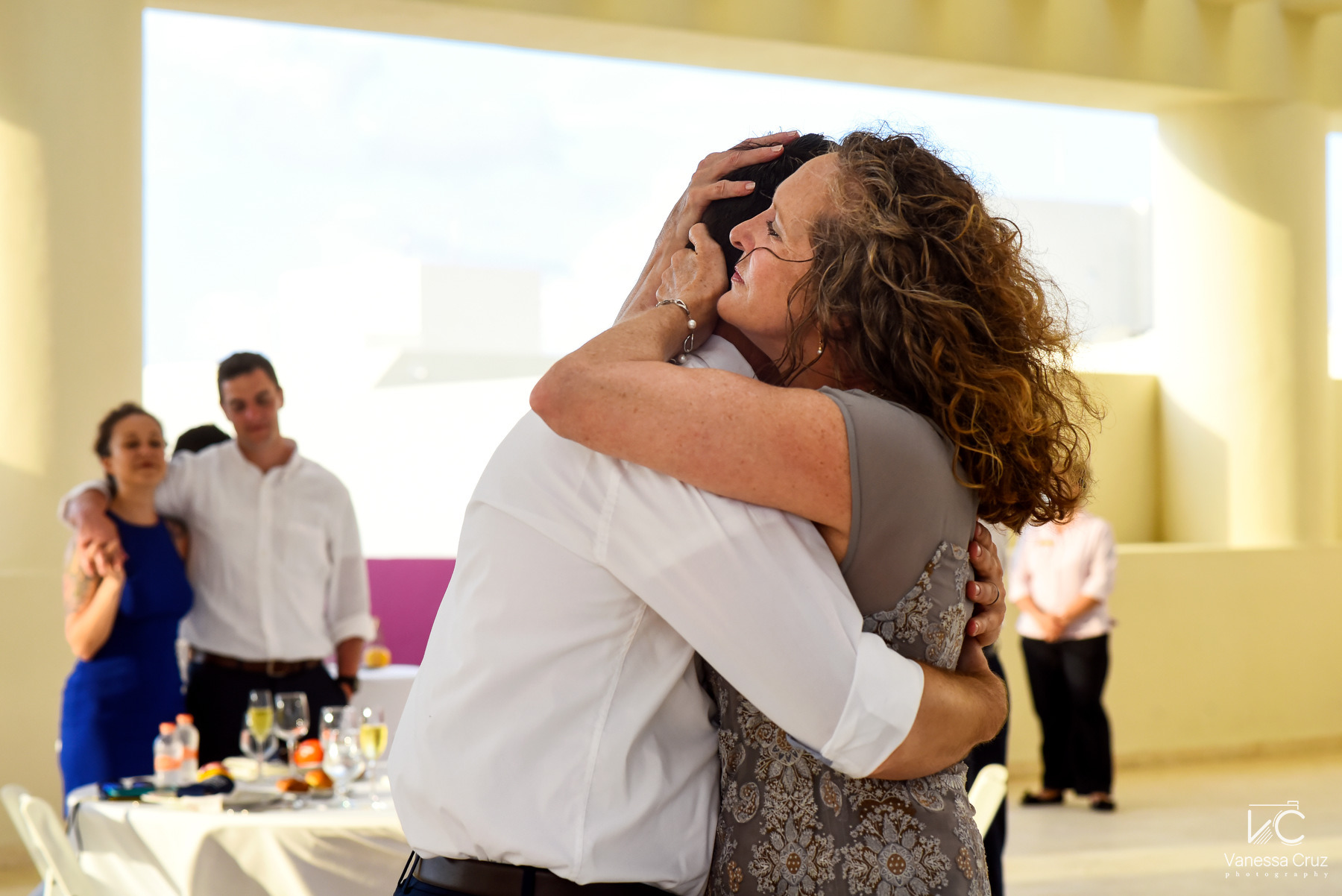 mother and groom hug Hyatt Ziva Cancun Mexico
