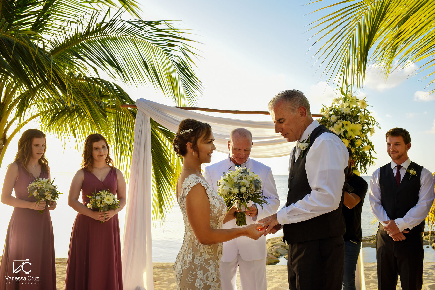 Bride and groom exchange rings Cozumel Wedding Villa Yak Alil Mexico